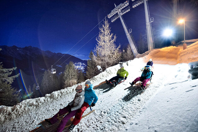 9_IMG__0000_TVBStubaiTirol_AndreSchoenherr_Tobogganing_Night_01